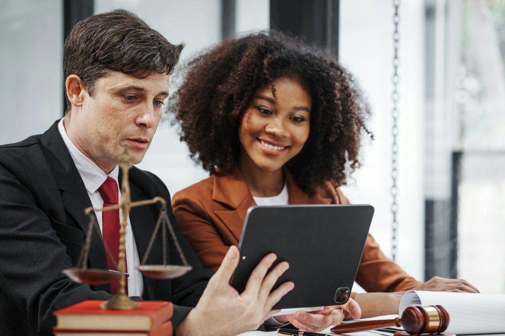 Law firm jobs, lawyer specialist, Business and Bankruptcy Lawyer discussing talking at meeting
